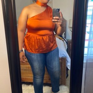 Sleeveless orange top